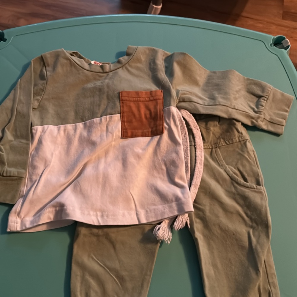 Green and White Baby Outfit with Brown Pocket